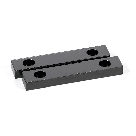A black serrated gripper made of hardened steel, designed for tool clamping in machining applications.