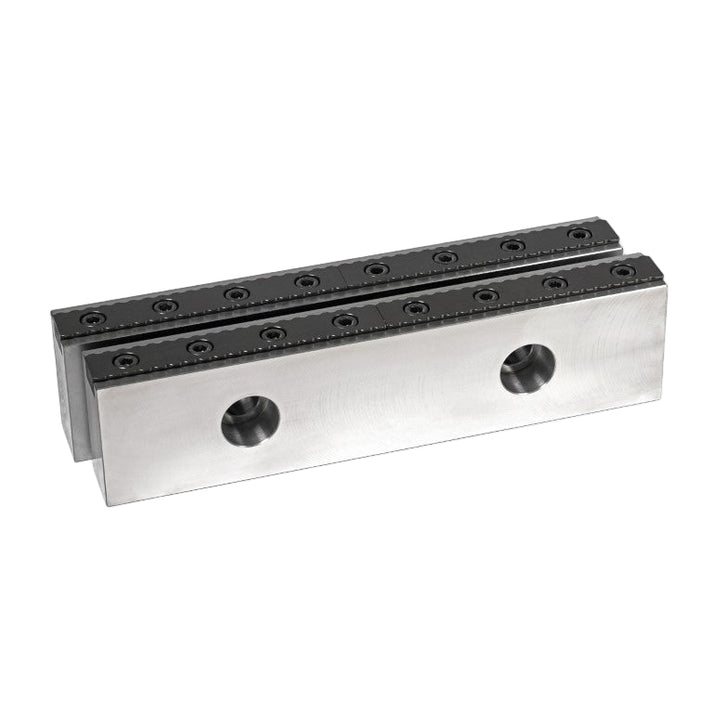 A set of serrated vice jaw components made of hardened steel, designed to be bolted into a standard machine vice.
