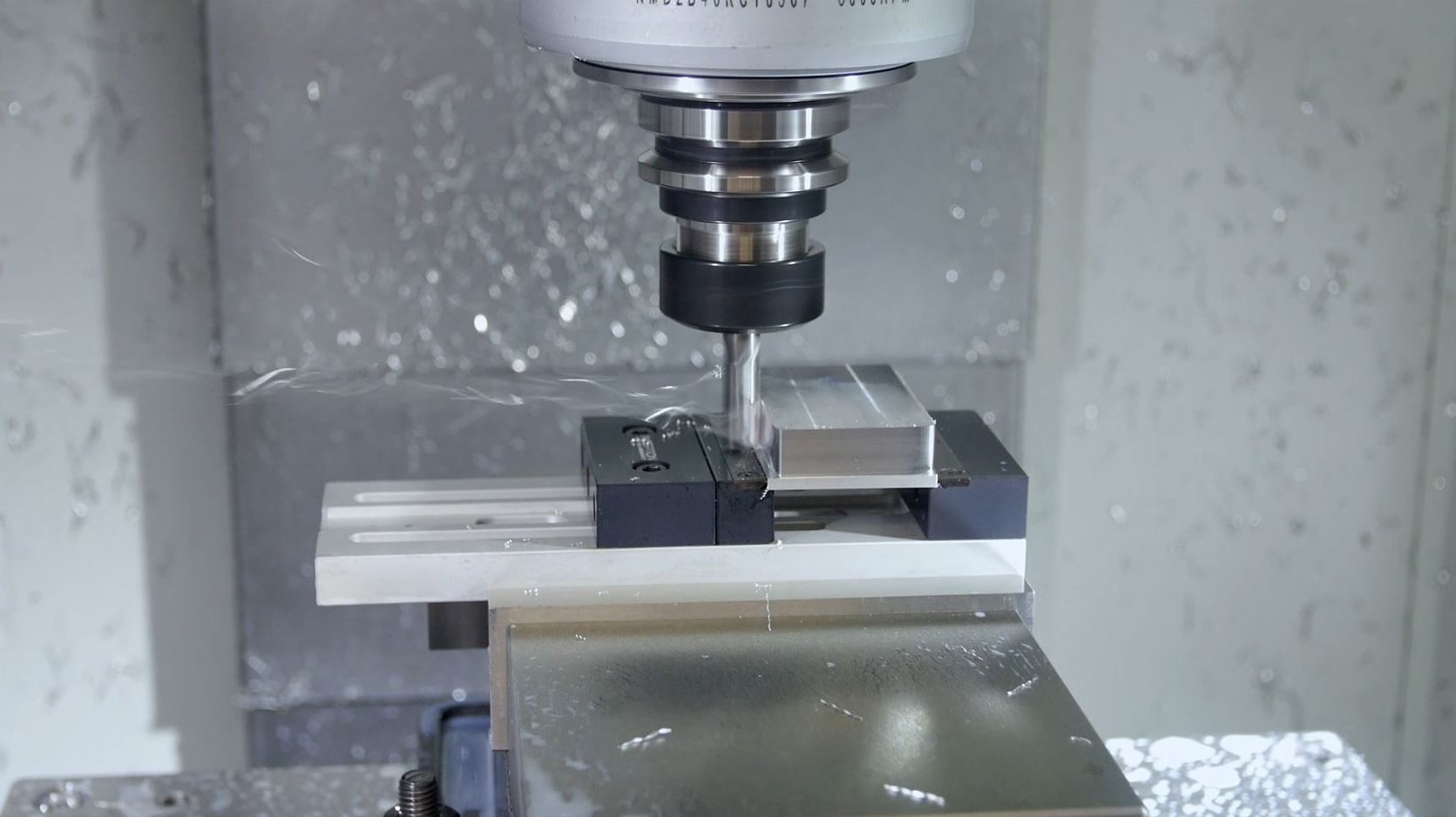 low profile vice machining aluminium in a vertical machining centre