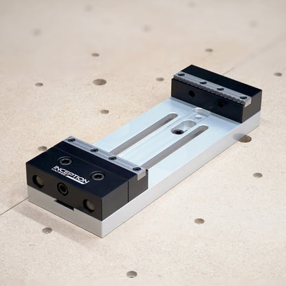 Low Profile Vice in the open position mounted to a cnc router wasteboard