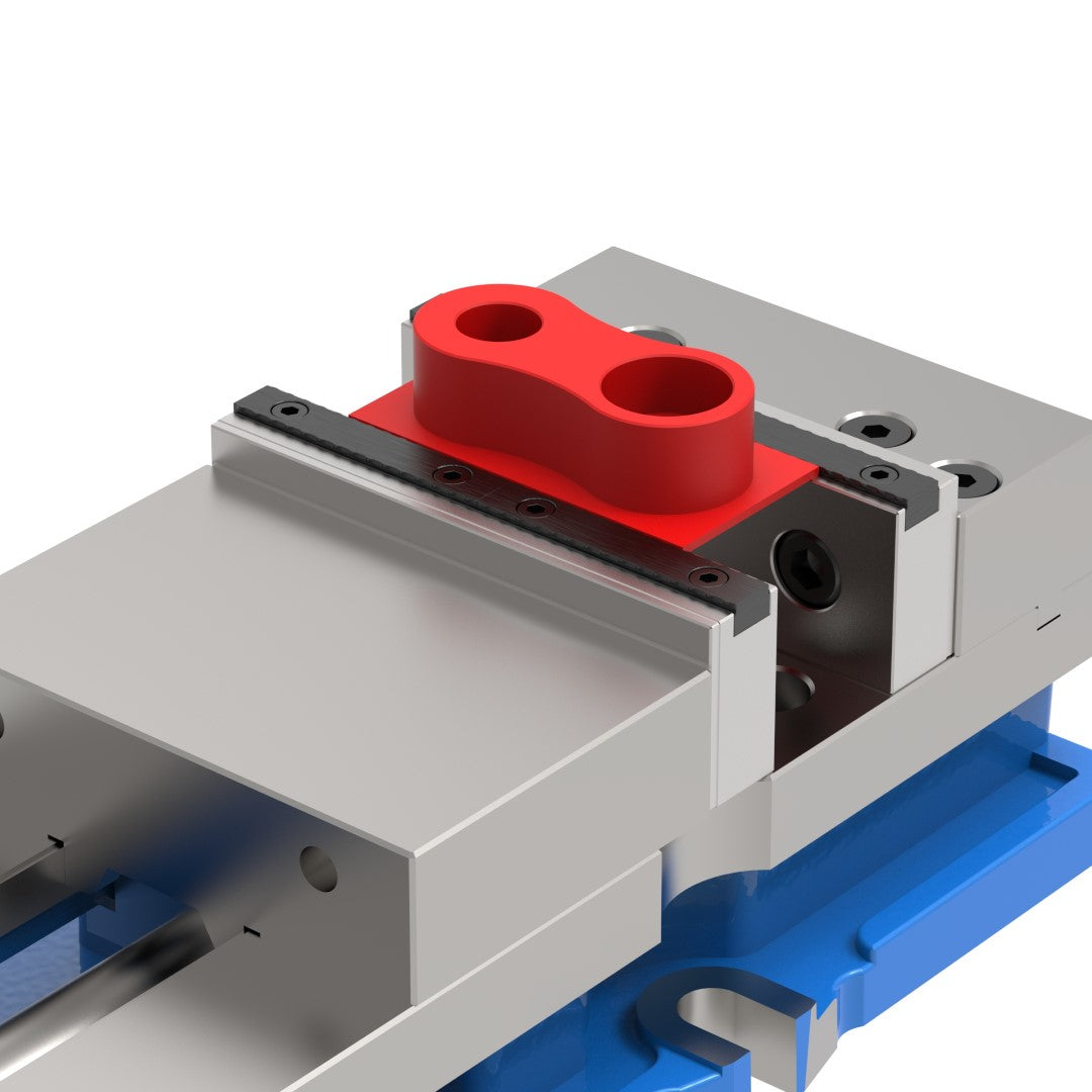 Serrated vice gripper jaws holding machined part in a 6